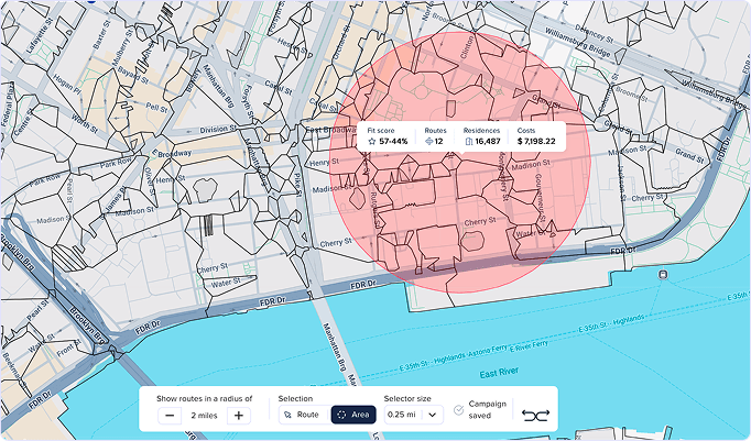 Map displaying a red circular radius over city blocks, river, and street networks.
